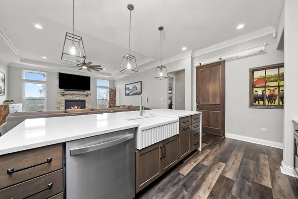 a living room with furniture fireplace and flat screen tv