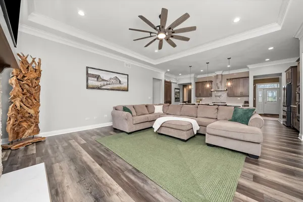 a living room with a table and a window