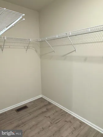 a view of a room with racks on the wall