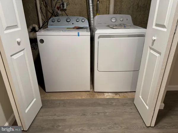 a utility room with dryer and washer