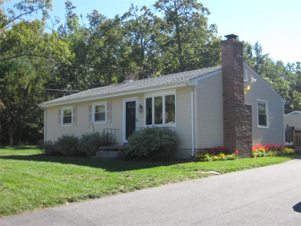 5 Mark Street Springfield, MA 01129 - Photo 1 of 7 a view of a house with a yard and large trees