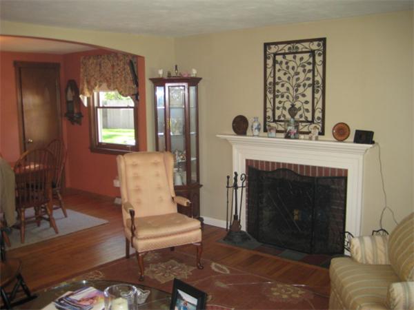5 Mark Street Springfield, MA 01129 - Photo 6 of 7 a living room with furniture and a fireplace