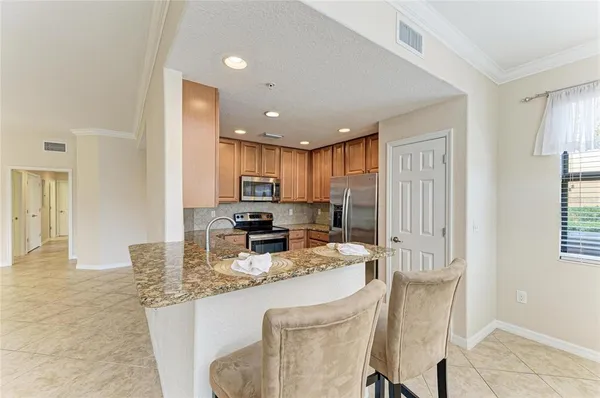 $422,500 | 7107 Grand Estuary Trail, Unit 101, Bradenton, FL 34212