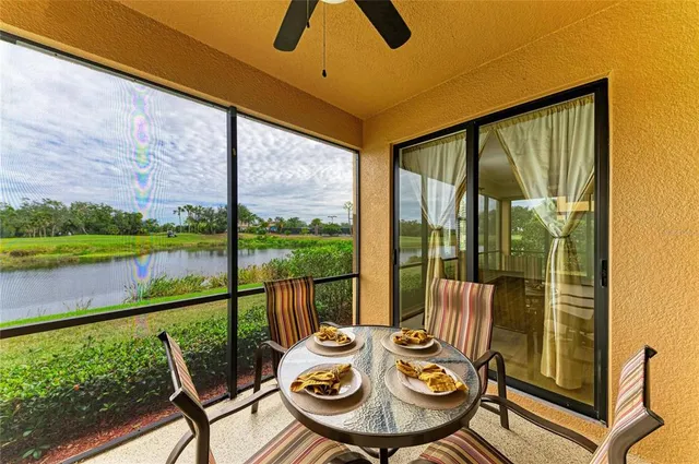 an aerial view of a house with big yard