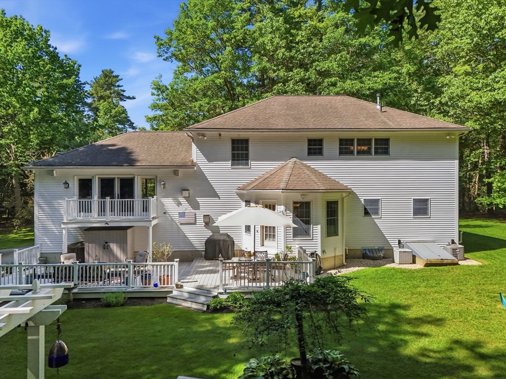 25 Haymeadow Road Boxford, MA 01921 - Photo 29 of 42 a aerial view of a house with a yard patio and fire pit