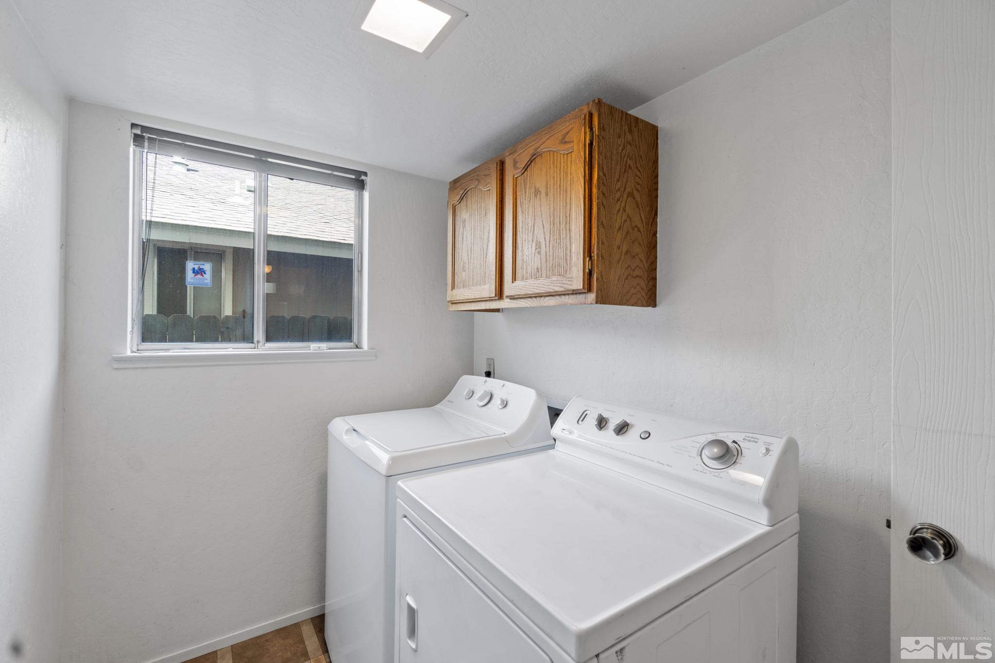 6187 White Water Way Reno, NV 89523 - Photo 21 of 33 a utility room with dryer and washer