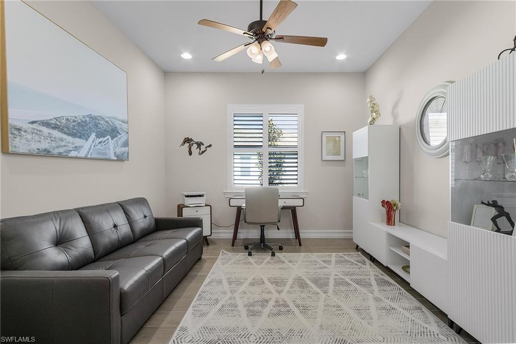 14539 Kelson Circle Naples, FL 34114 - Photo 17 of 37 Home office featuring tile floors, a ceiling fan, and recessed lighting