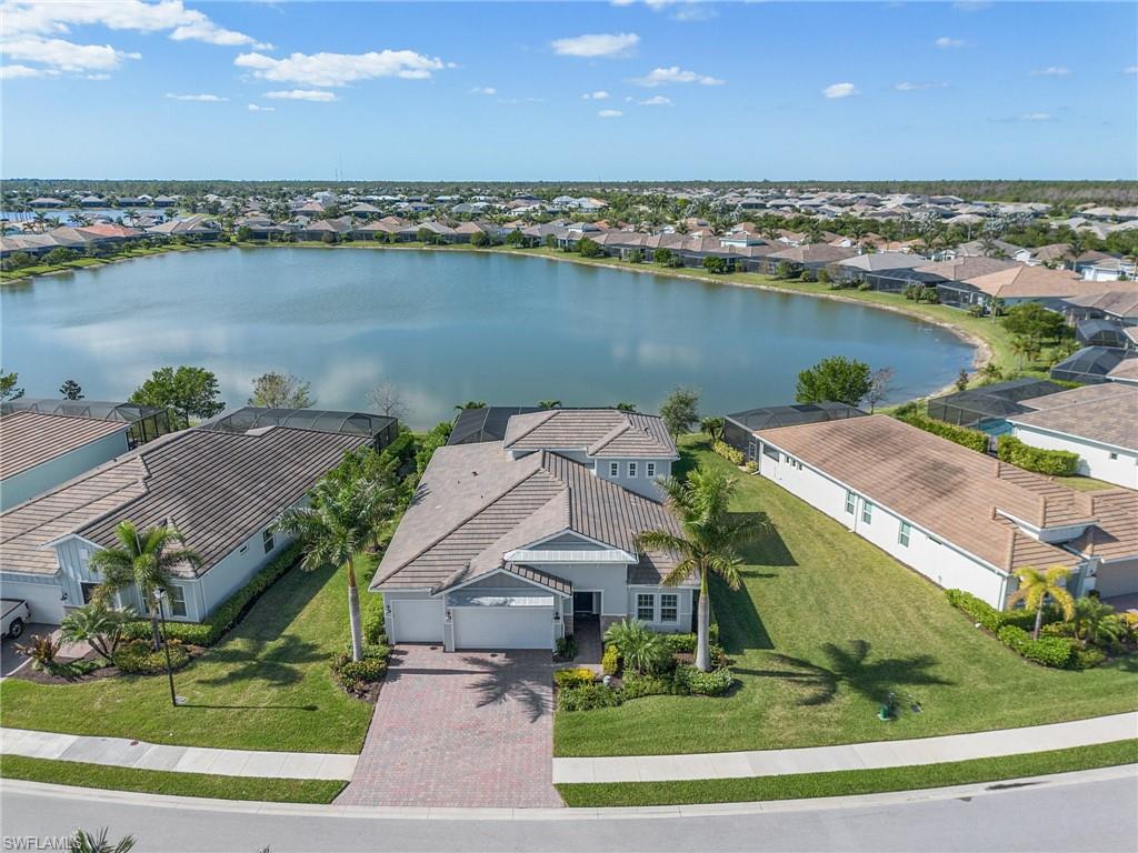 14539 Kelson Circle Naples, FL 34114 - Photo 2 of 37 Aerial view of home with lakefront view