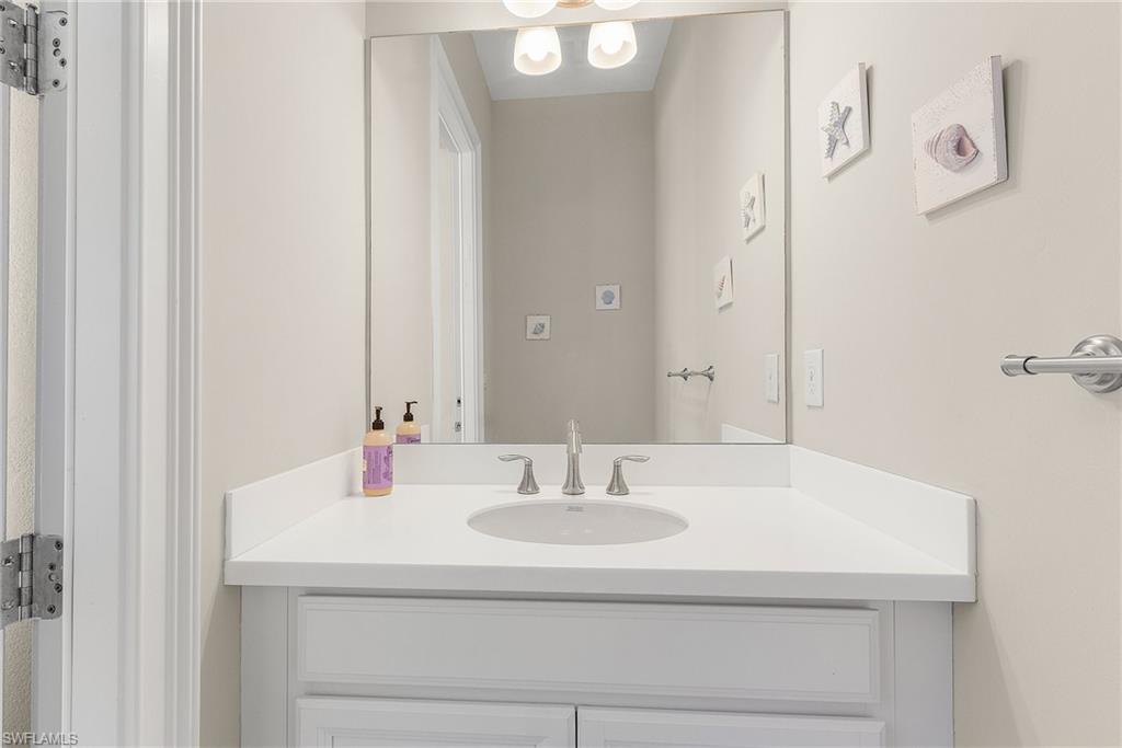 14539 Kelson Circle Naples, FL 34114 - Photo 33 of 37 Outdoor Pool Half Bathroom