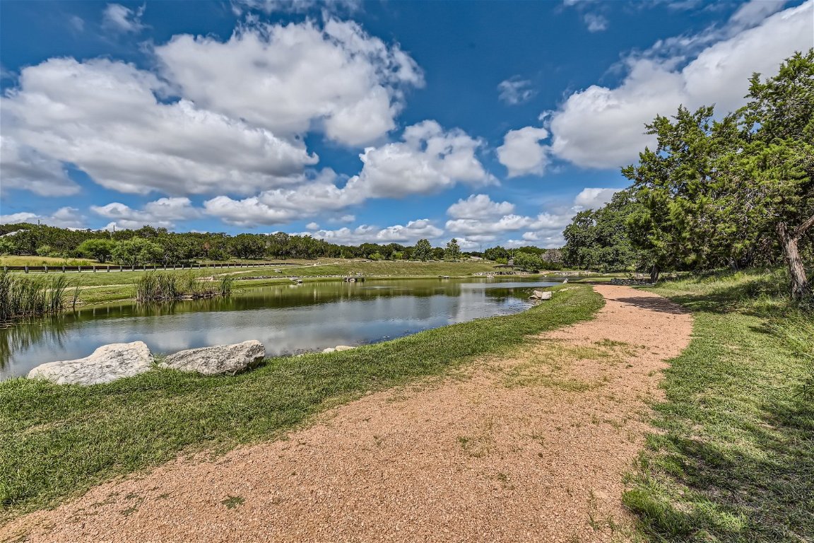 2113 Barbaro Way, Unit 14 Spicewood, TX 78669 - Photo 16 of 18 Community Pond and Hiking Trail