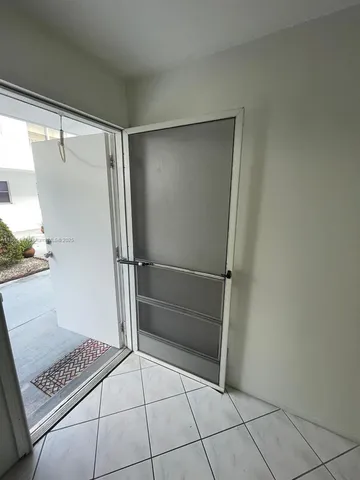 a bathroom with a bath tub and shower