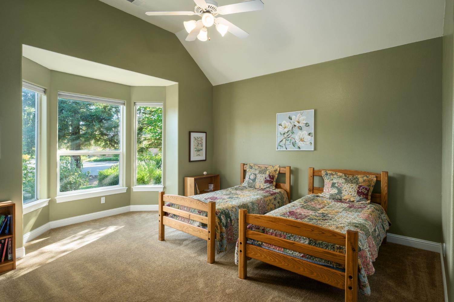 3386 East Vía Monte Verdi Clovis, CA 93619 - Photo 29 of 51 a bedroom with a bed and a large window
