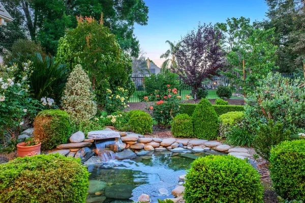 a garden view with a seating space