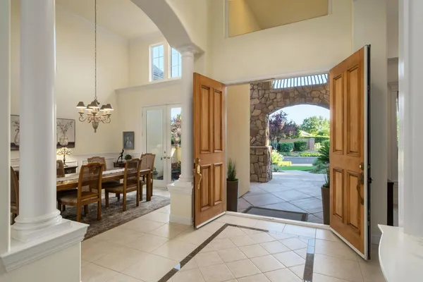 a view of a livingroom with furniture and front door
