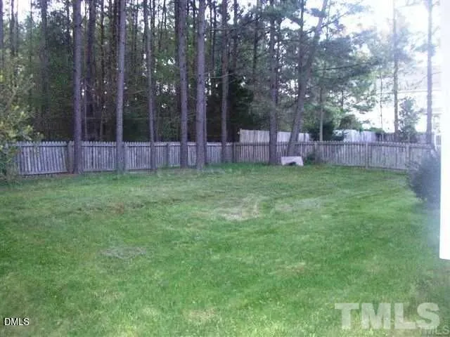 a view of yard with trees