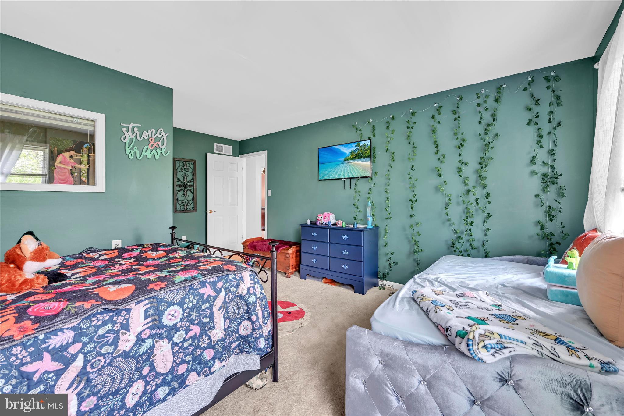 1602 Churchill Road Harrisburg, PA 17111 - Photo 33 of 61 a bedroom with a bed and a painting on the wall