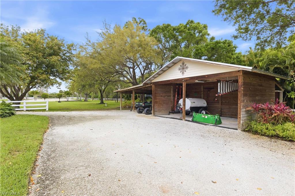 3800 Staley Road Fort Myers, FL 33905 - Photo 20 of 50 a front view of a house with garden