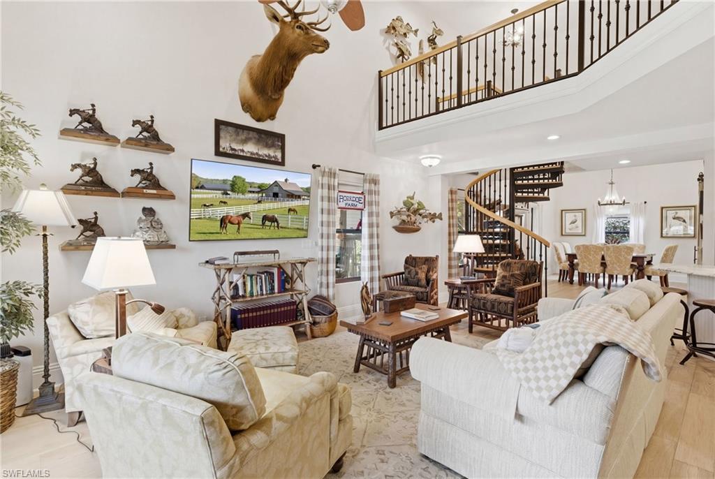 3800 Staley Road Fort Myers, FL 33905 - Photo 30 of 50 a living room with furniture and a flat screen tv