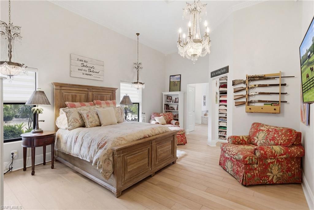 3800 Staley Road Fort Myers, FL 33905 - Photo 32 of 50 a spacious bedroom with a bed and a couch