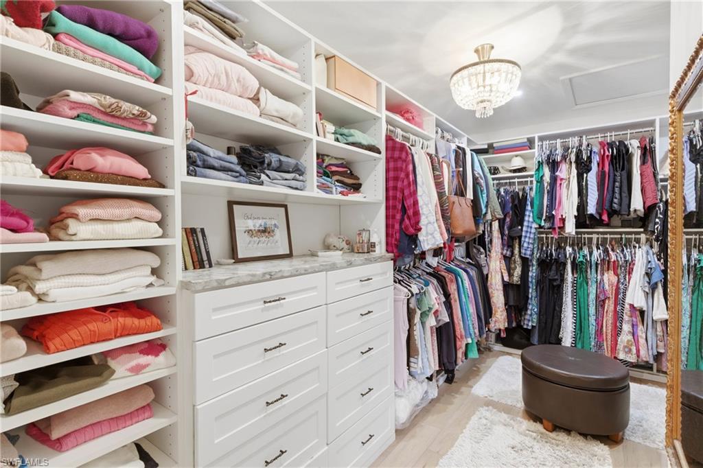 3800 Staley Road Fort Myers, FL 33905 - Photo 35 of 50 a view of walk in closet with clothes and shoes