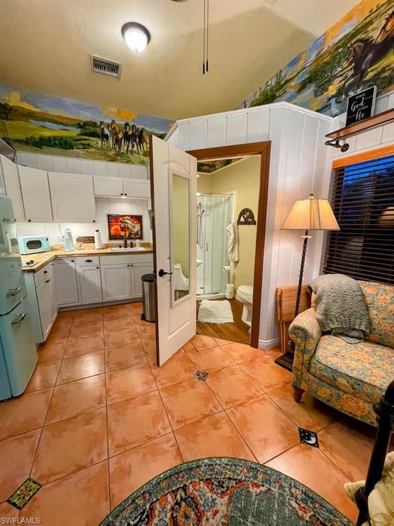 3800 Staley Road Fort Myers, FL 33905 - Photo 43 of 50 a lobby with furniture and a rug