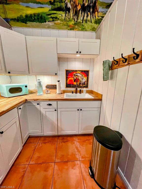 3800 Staley Road Fort Myers, FL 33905 - Photo 45 of 50 a kitchen with a sink and cabinets
