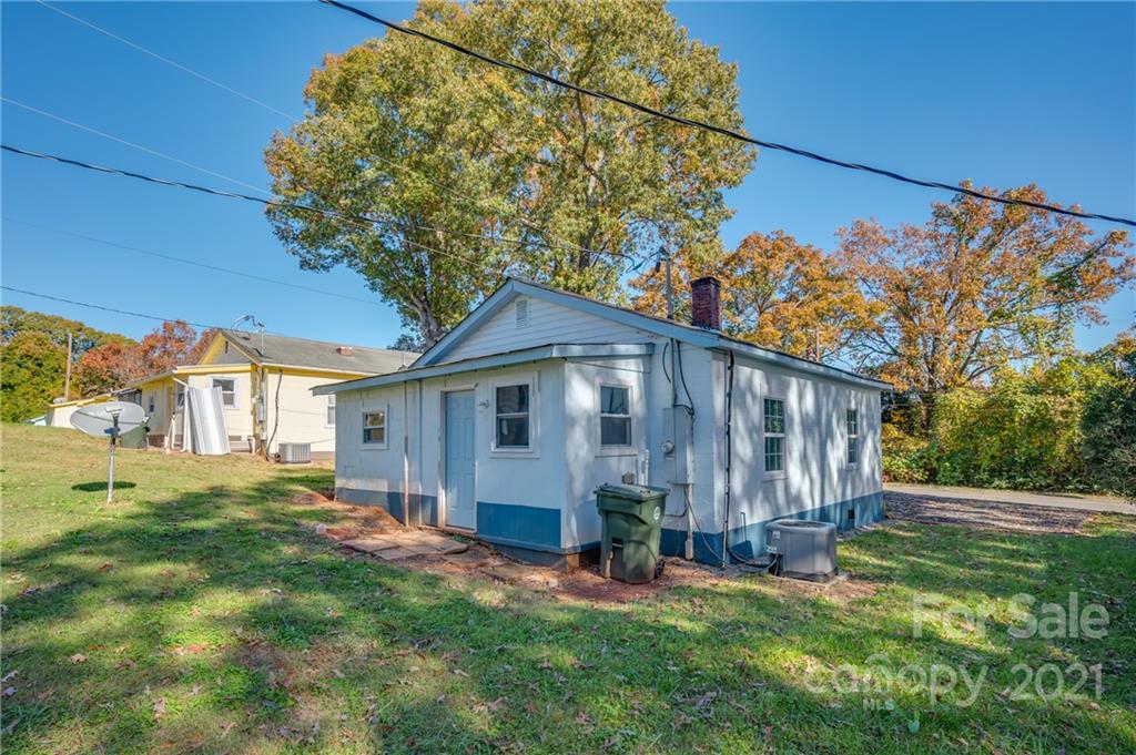 135 North Ridgecrest Avenue Rutherfordton, NC 28139 - Photo 17 of 18 a view of a house with a yard