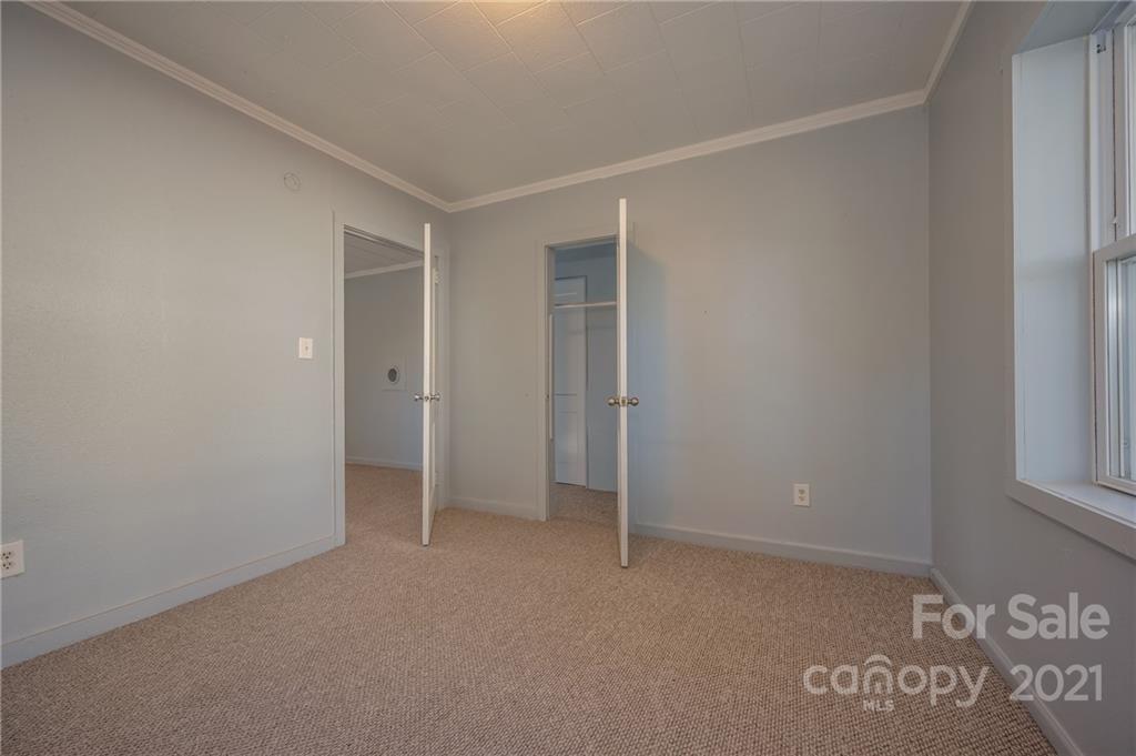 135 North Ridgecrest Avenue Rutherfordton, NC 28139 - Photo 10 of 18 a view of an empty room