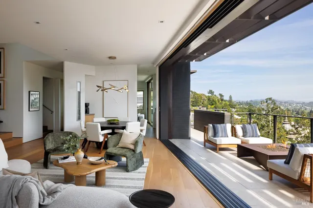 a very nice looking living room with a large window
