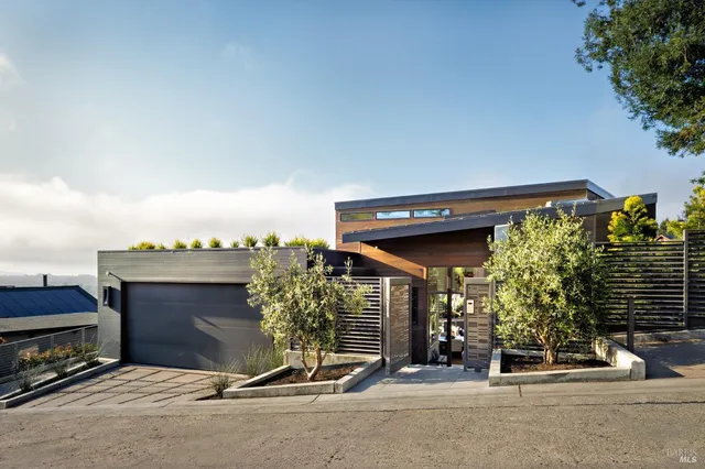 a view of a entryway with wooden floor and glass door