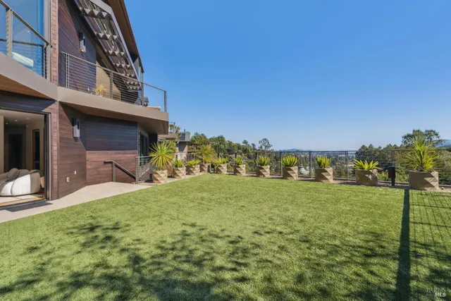 a kitchen with a stove and a refrigerator