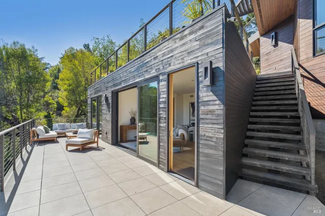 a view of house with outdoor seating