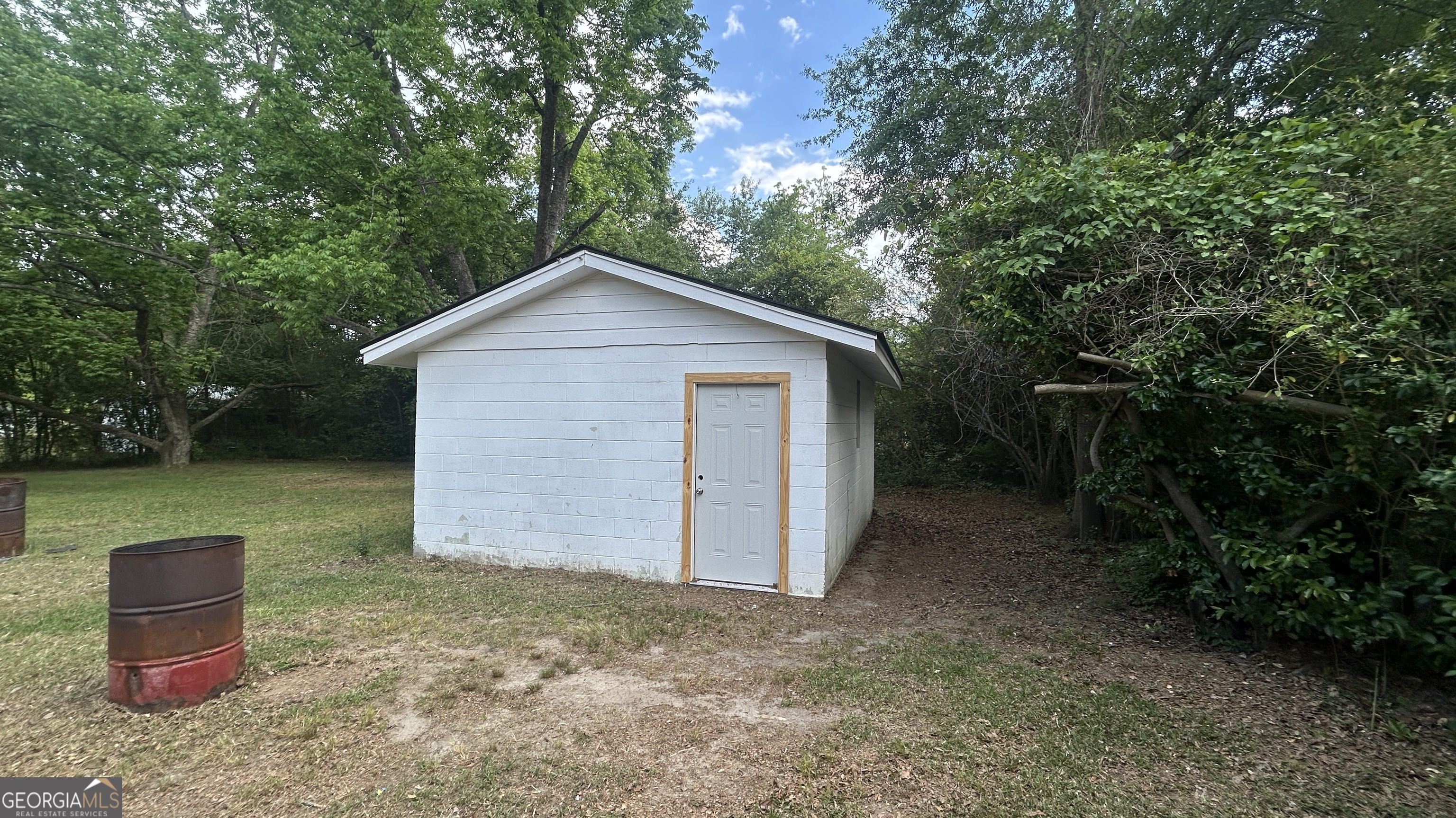 2552 Allan Way Macon, GA 31206 - Photo 11 of 14 a backyard of a house with lots of green space