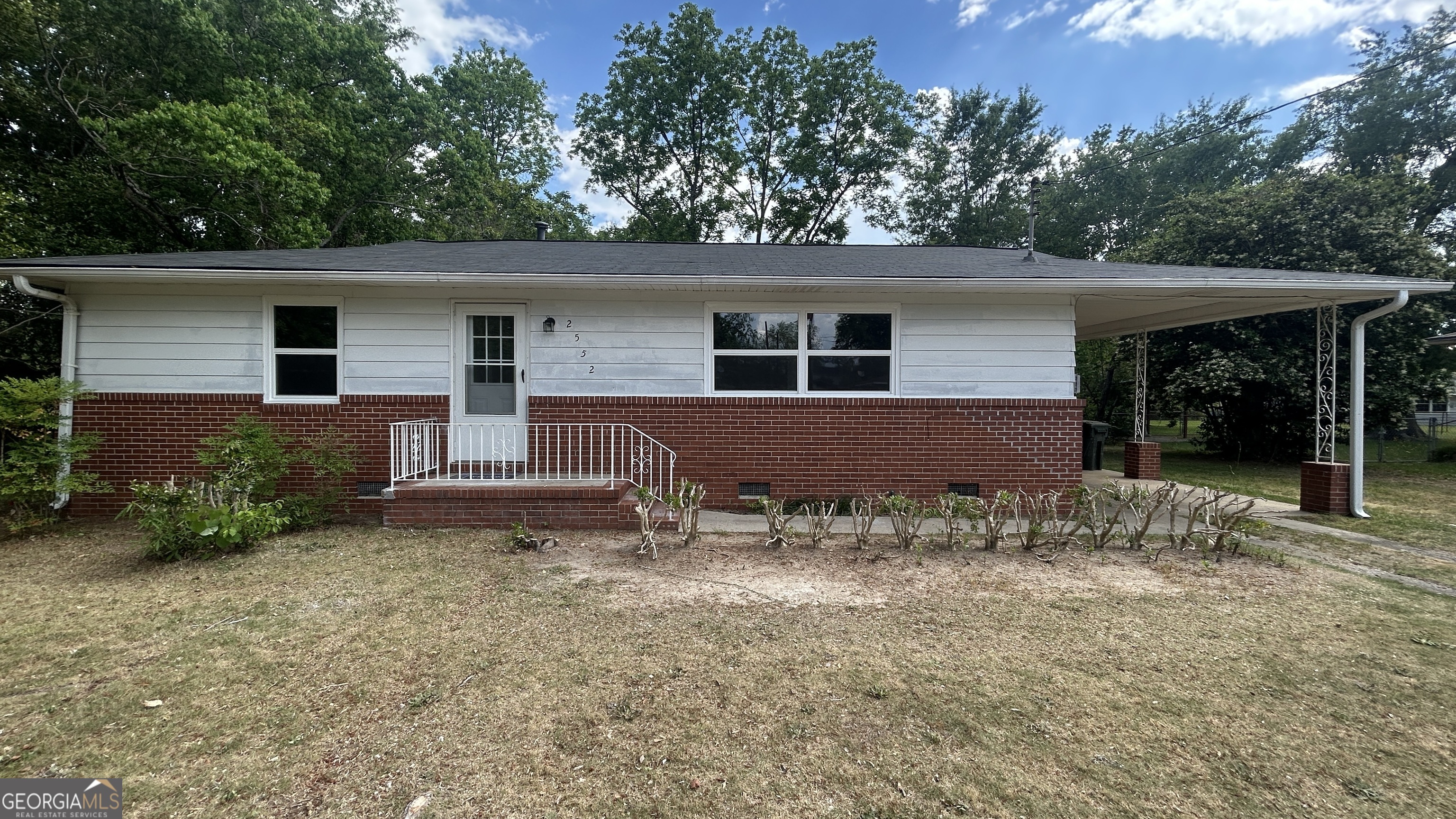 2552 Allan Way Macon, GA 31206 - Photo 2 of 14 a backyard of a house with yard and outdoor seating