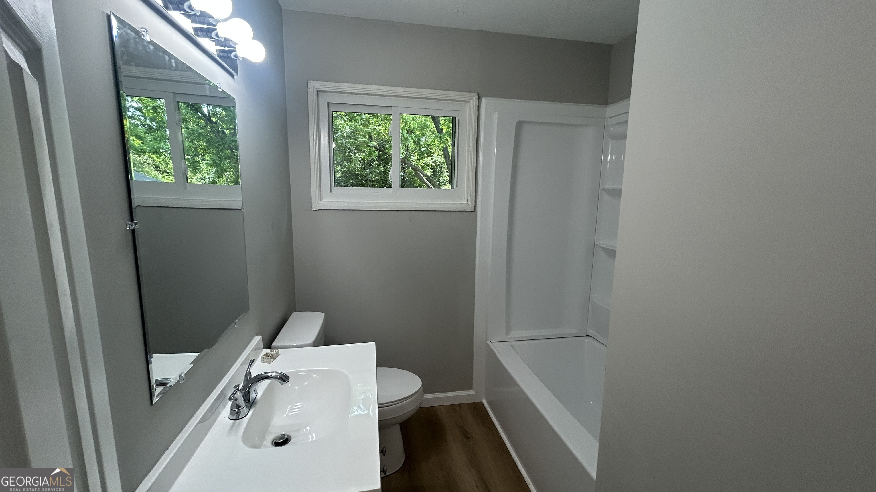 2552 Allan Way Macon, GA 31206 - Photo 8 of 14 a bathroom with a sink and a mirror