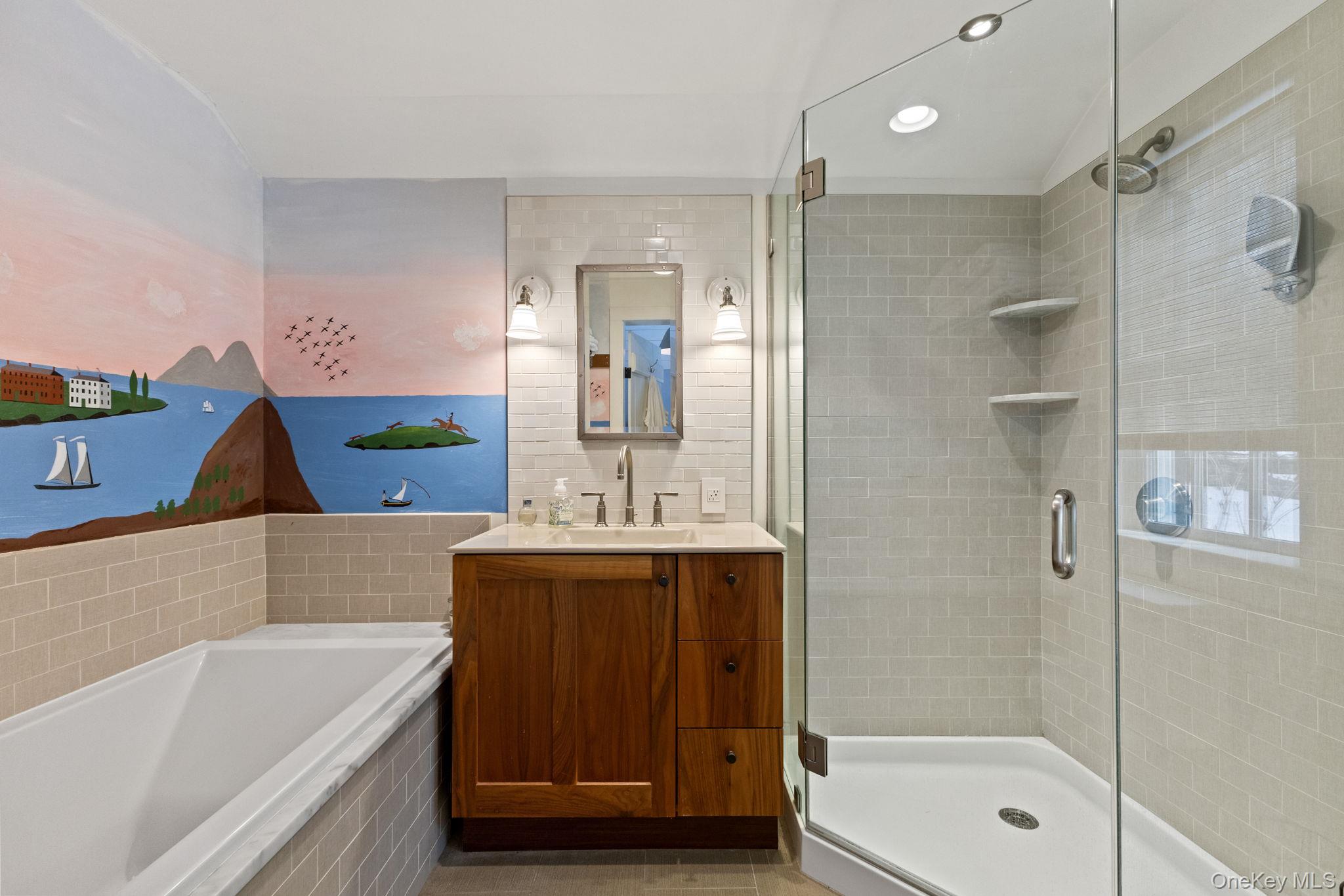 8 South Bedford Road Pound Ridge, NY 10576 - Photo 20 of 32 a bathroom with a tub a sink and a shower