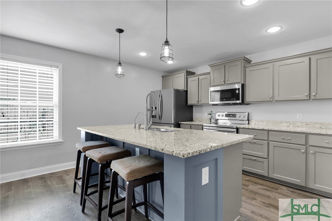 104 Laurel Lane Guyton, GA 31312 - Photo 13 of 47 Granite breakfast bar.