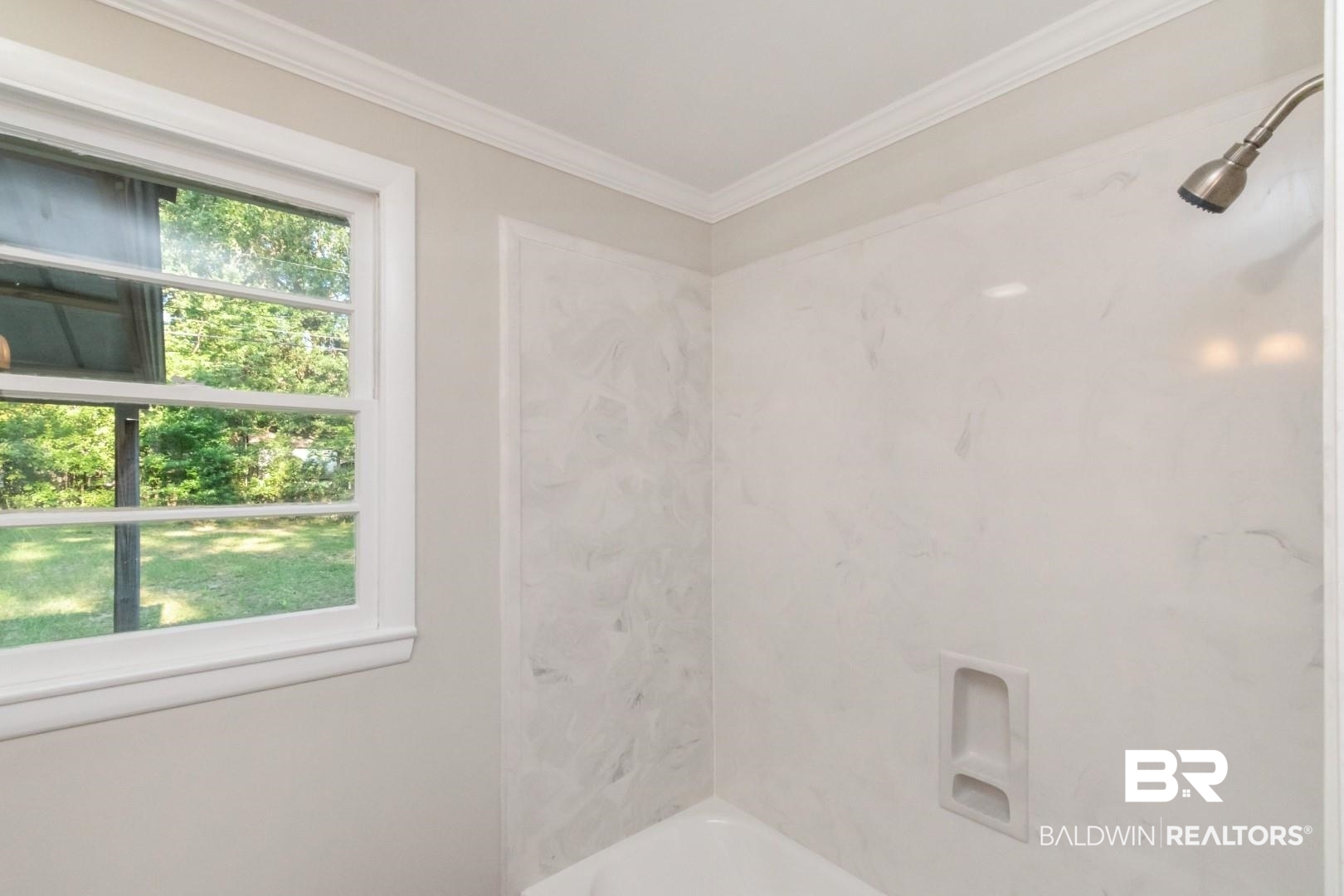 1220 Garland Drive Mobile, AL 36618 - Photo 16 of 25 Bathroom with crown molding and tub / shower combination