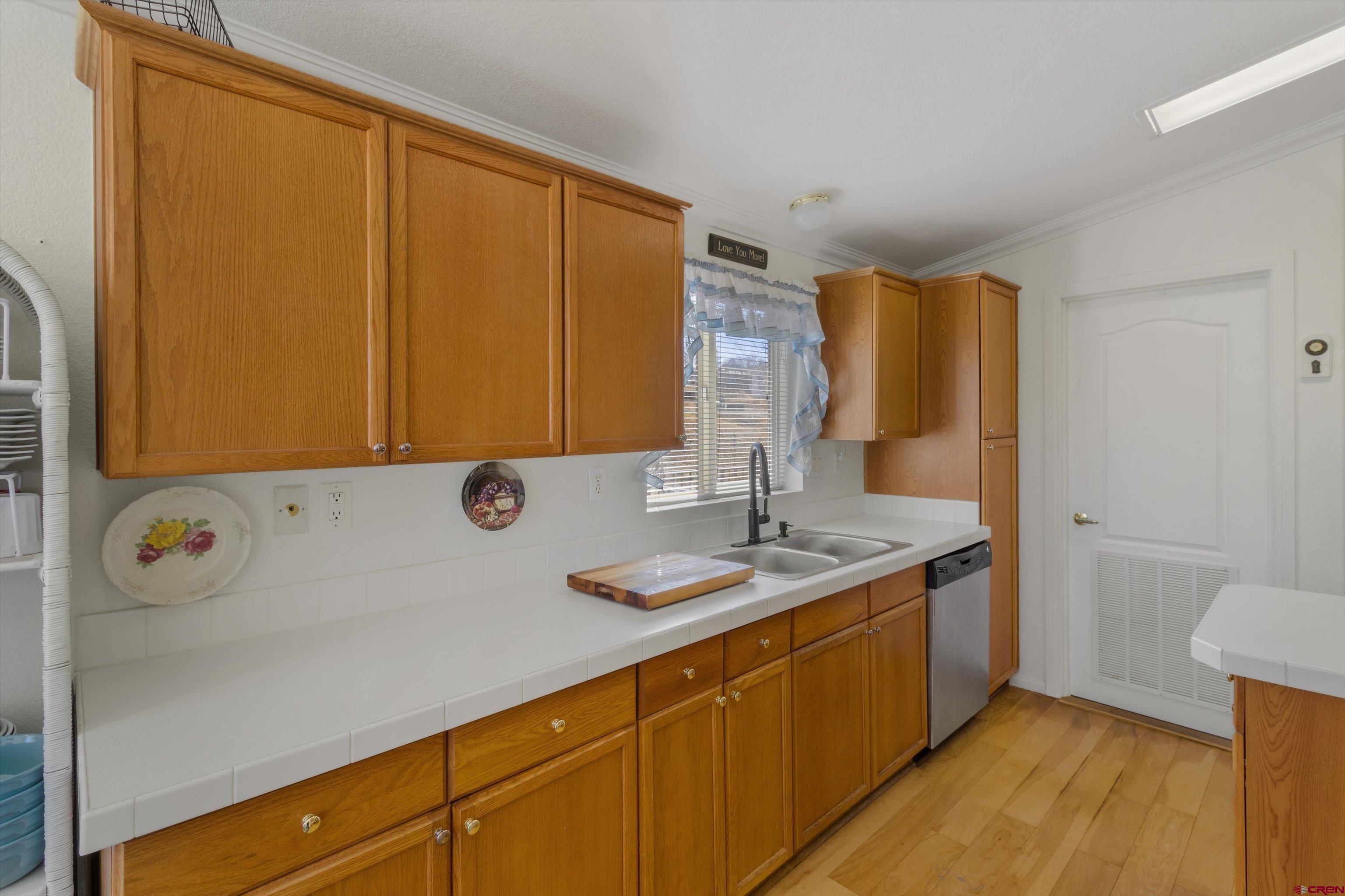 34 Silverview Court Durango, CO 81303 - Photo 15 of 29 a bathroom with a granite countertop sink and a mirror