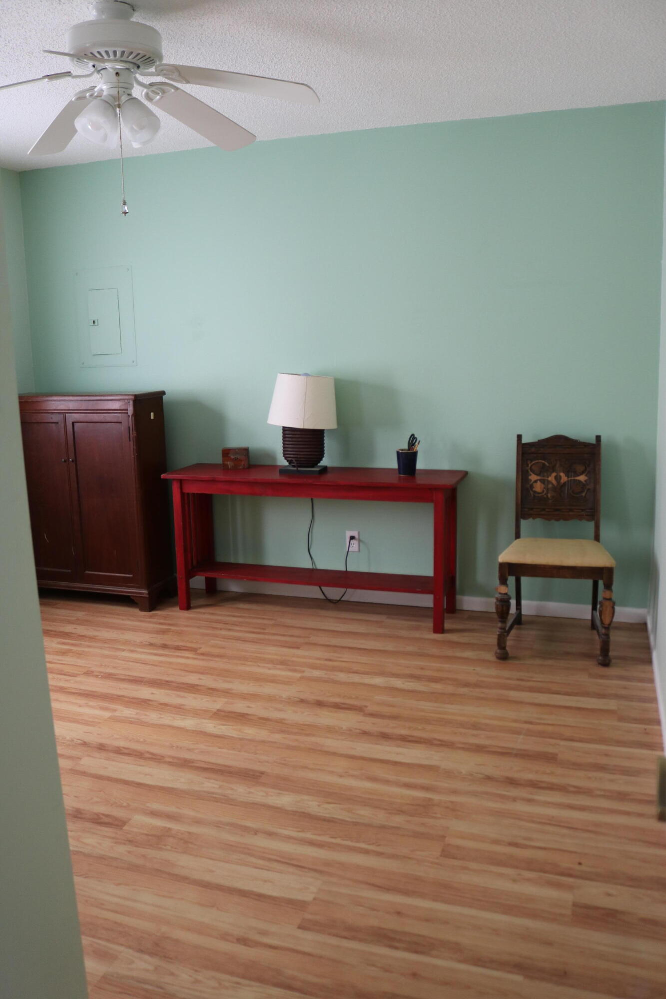 265 Howell Bluff Road Ponce de Leon, FL 32455 - Photo 14 of 18 a view of a room with wooden floor and furniture