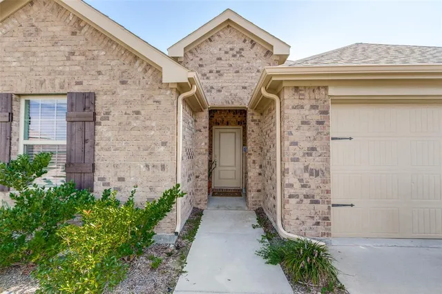 front view of a house with a pathway