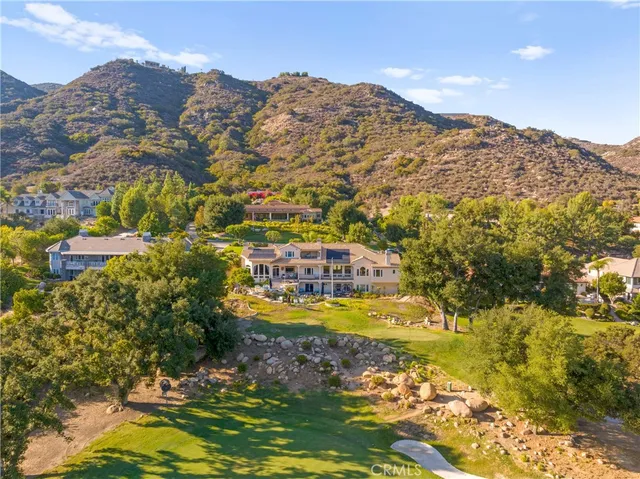a view of a city with mountains in the background