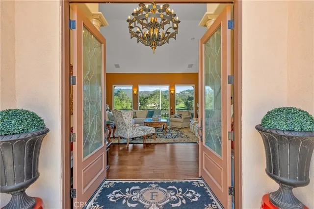 a view of entryway with wooden floor