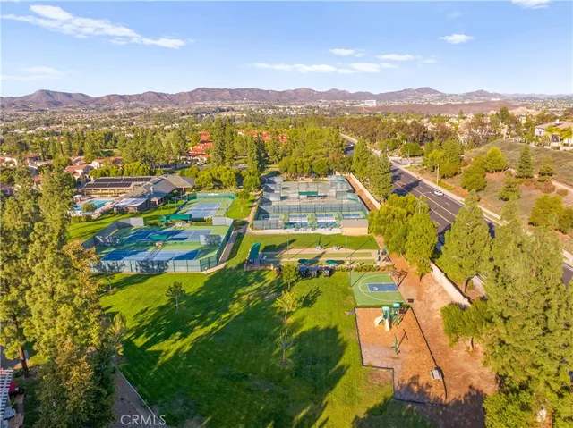 a view of a city with mountains in the background