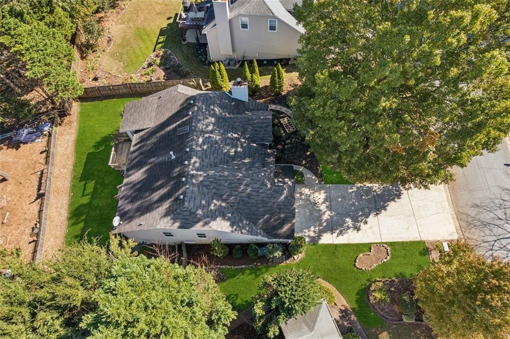 2470 Jakin Way Suwanee, GA 30024 - Photo 5 of 64 a aerial view of a house with a yard