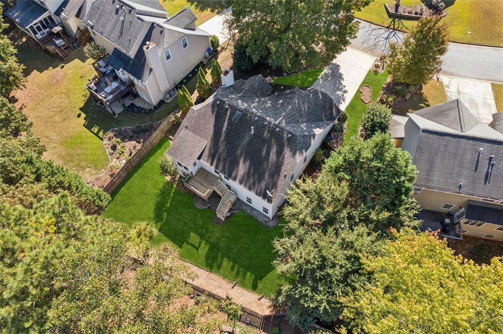 2470 Jakin Way Suwanee, GA 30024 - Photo 52 of 64 a aerial view of a house with a yard