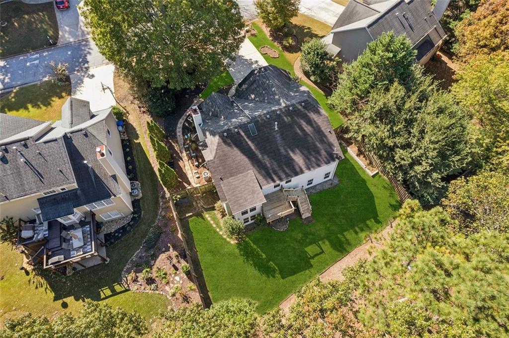 2470 Jakin Way Suwanee, GA 30024 - Photo 53 of 64 an aerial view of a house with a yard