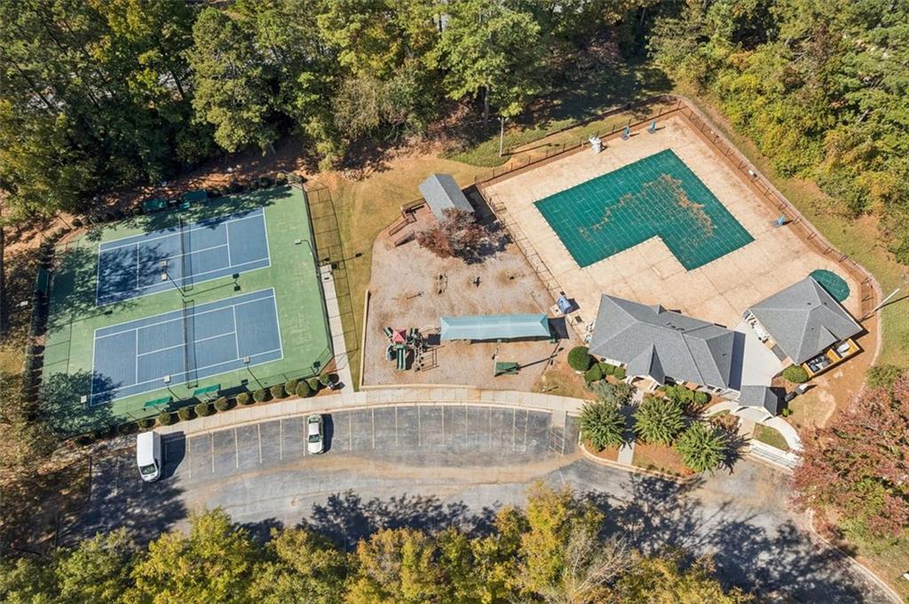 2470 Jakin Way Suwanee, GA 30024 - Photo 55 of 64 an aerial view of a house with a yard