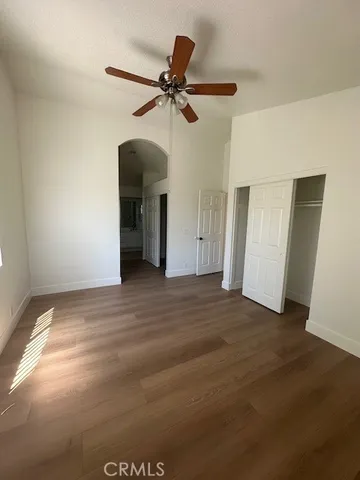 a view of swimming pool with lake view and mountain in the back