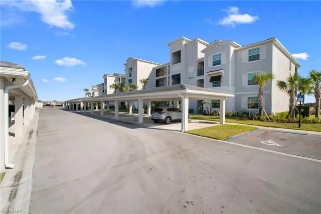 a view of houses with a swimming pool